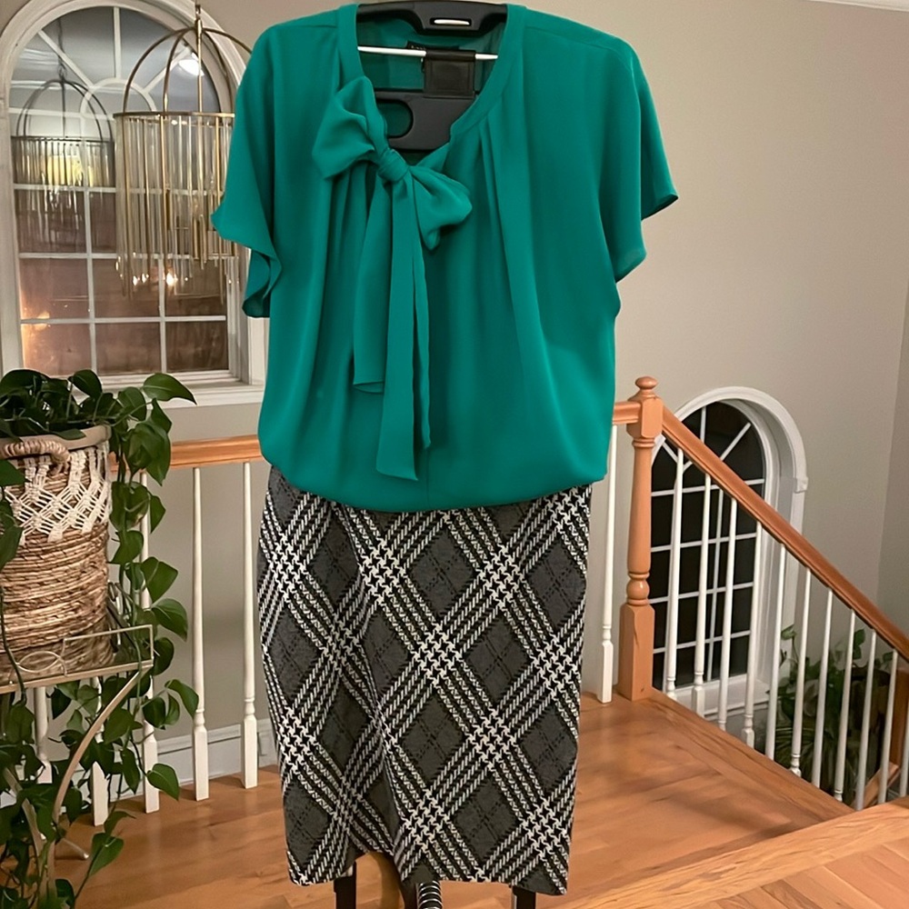 Green blouse with v neck and tie detail in the front from Lane Bryant, size 18.